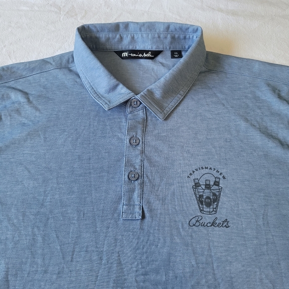 Travis Mathew Golf Polo Shirt Mens Size 2XL Blue Buckets Chest Logo - Picture 2 of 7
